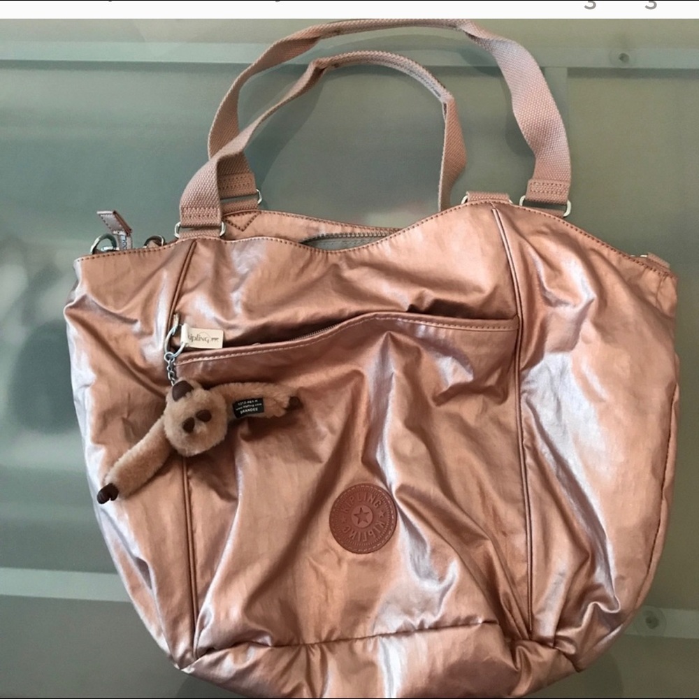 Kipling rose gold purse like new